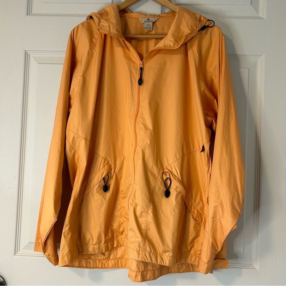 Woolrich Womens Large yellow/orange windbreaker jacket,hood and zipper pockets.